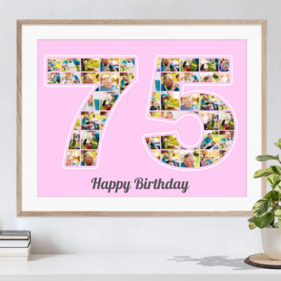 Schöne Geschenkidee zum Geburtstag personalisierte Zifferncollage 75 mit eigenen Bildern auf rosa Hintergrund in hellem Holzrahmen an eine Wand gelehnt neben einer Pflanze