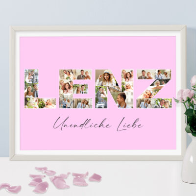 Familienname Lenz als Buchstabencollage mit Text und rosa Hintergrund in hellen Rahmen zum ersten Hochzeitstag auf Kommode